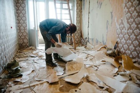 worker cleans trash apartment bag 99692 1483